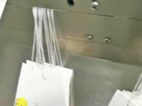 吊牌穿繩打結(jié)機(jī)